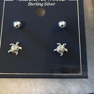 Sterling silver post earrings.